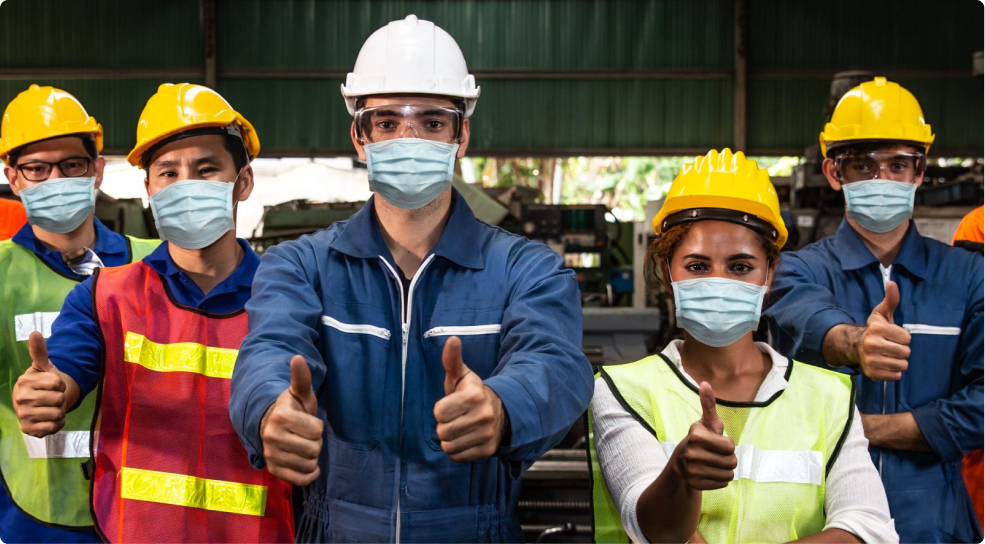 Workers wearing masks COVID safety