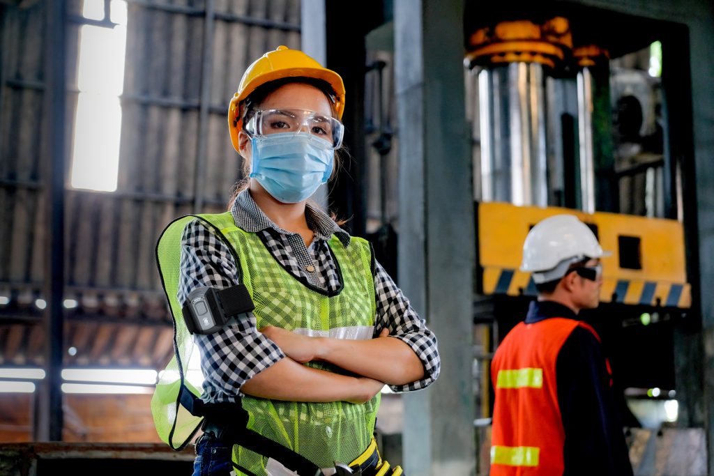 Worker with wearable device PPE